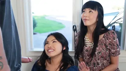 Chinese is observing while her daughter-in-law-in-law-in-law gives a palm-job